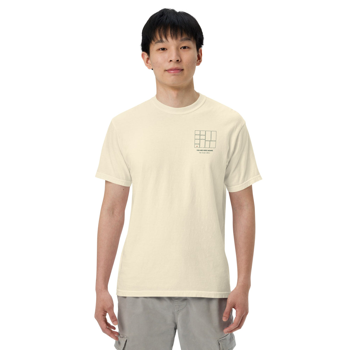 A model wearing the You Are Here (Again) tee in ivory