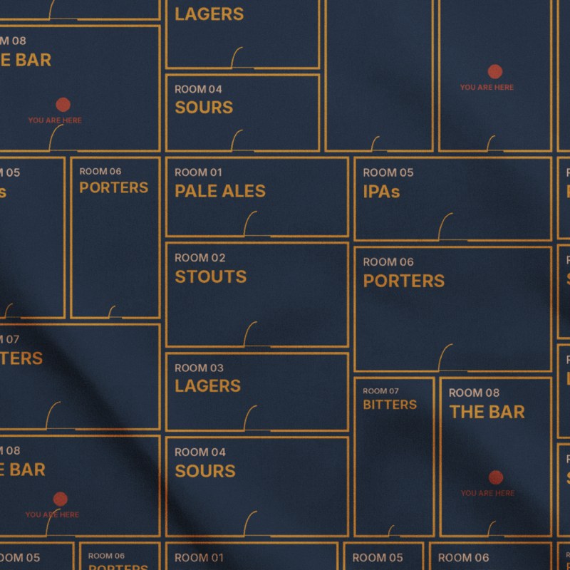 Close-up of the amber floorplan pattern on the navy bandana