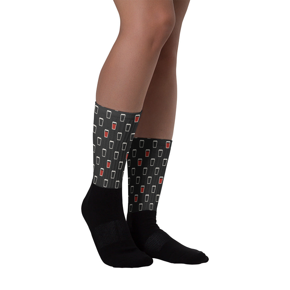 Pint pattern socks being worn